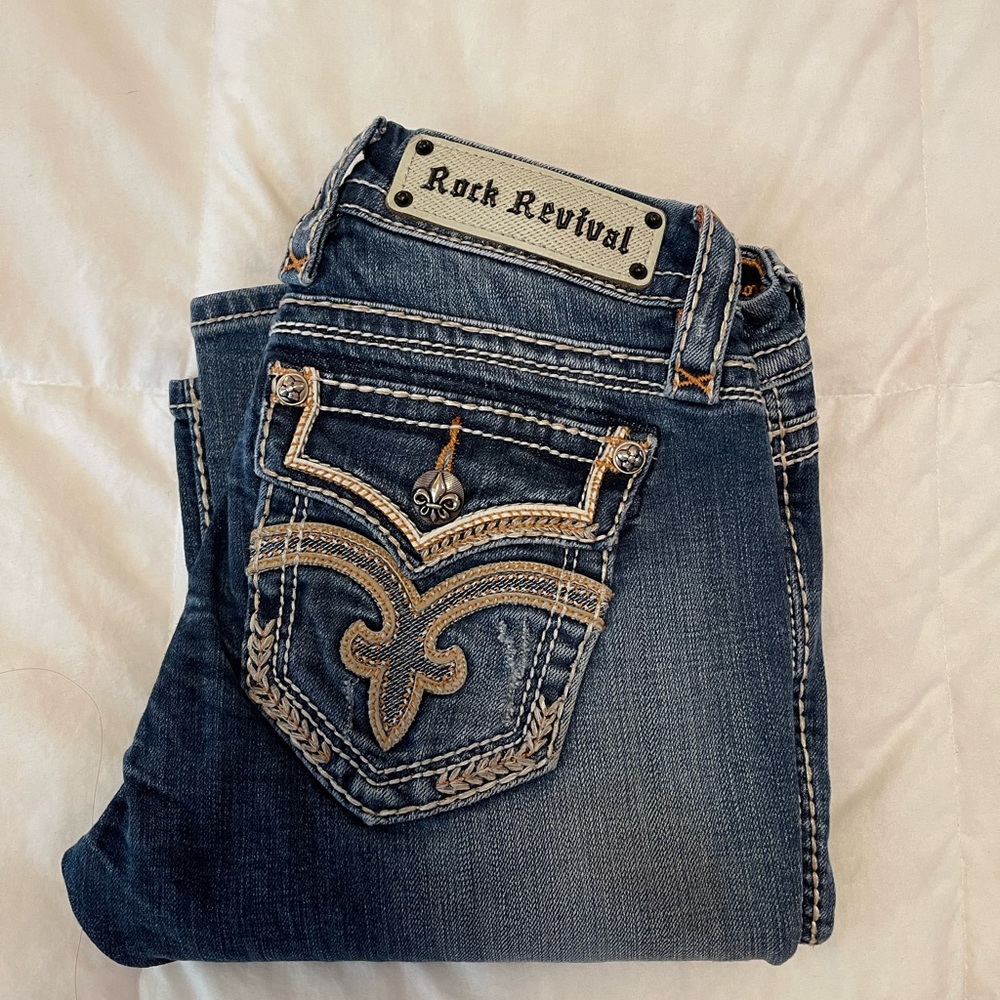 LIKE NEW - ROCK REVIVAL BONA BOOT CUT
JEANS - SIZE 27